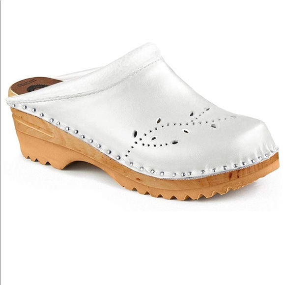 white wooden clogs